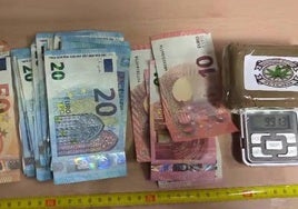 Dinero y droga incautada por la Guardia Civil.